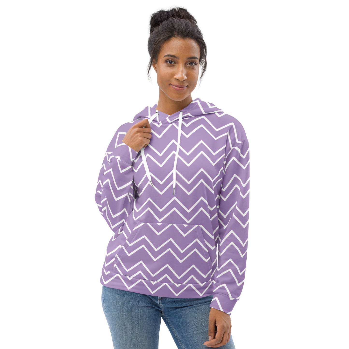 Woman wearing a purple hoodie with white zigzag pattern on a white background